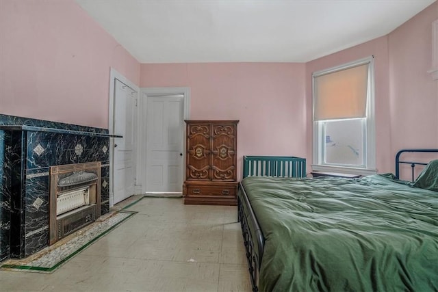 bedroom with a fireplace