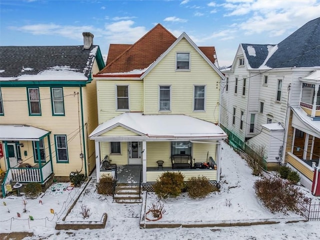 view of front of property featuring covered porch