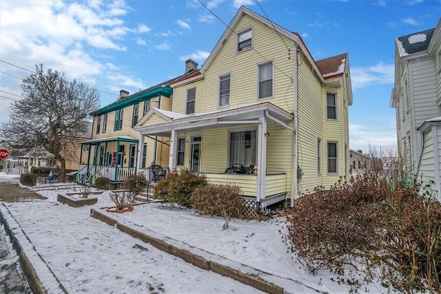 front facade featuring covered porch