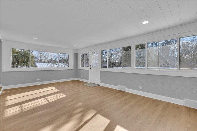 empty room with light wood-type flooring