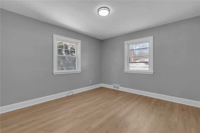 empty room featuring light hardwood / wood-style floors