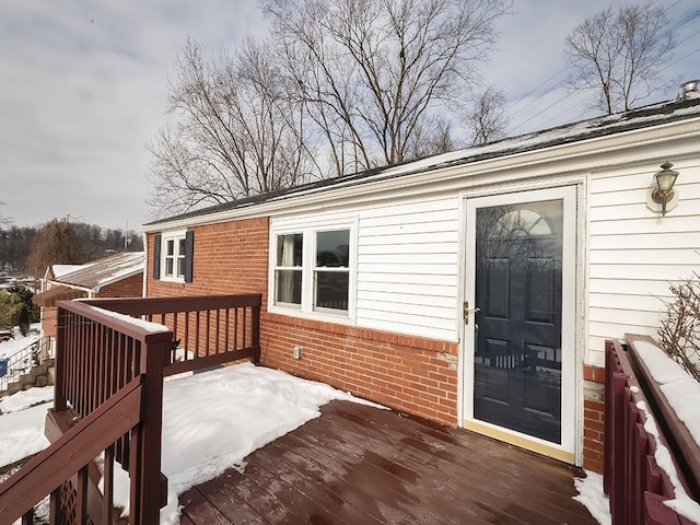 view of snow covered deck