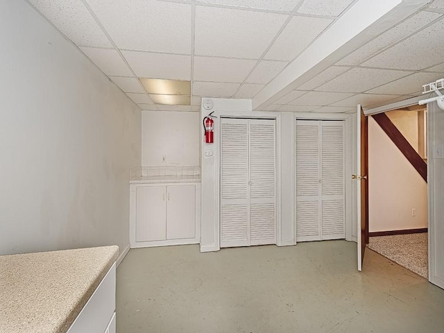 basement with a drop ceiling