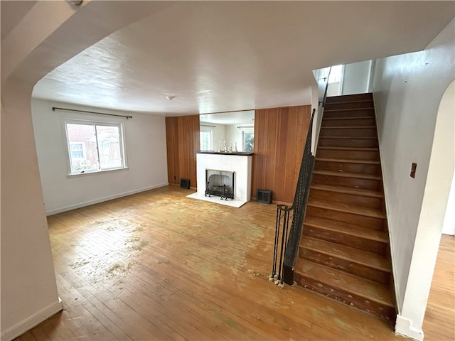 unfurnished living room with light hardwood / wood-style flooring