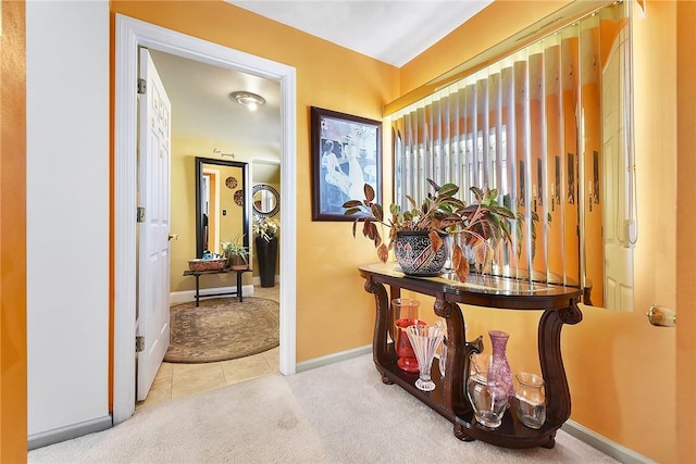 corridor with light colored carpet