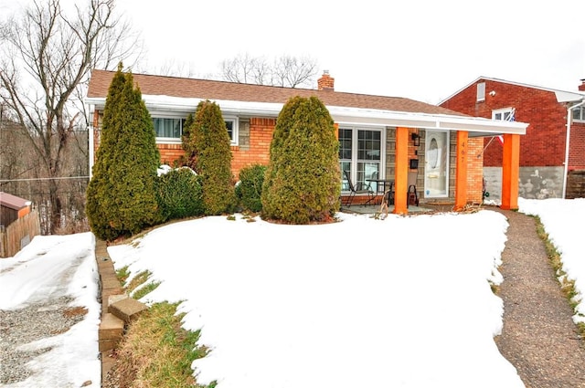 view of snow covered property