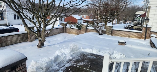 view of yard covered in snow