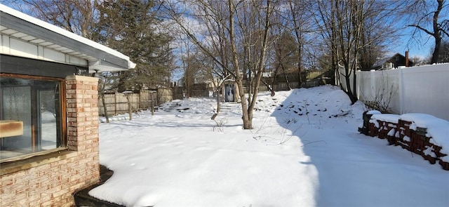 view of snowy yard