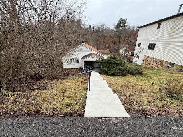 view of front of home with a front yard