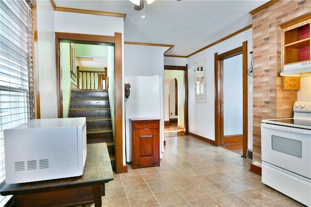 kitchen with ceiling fan, white range with electric stovetop, and crown molding