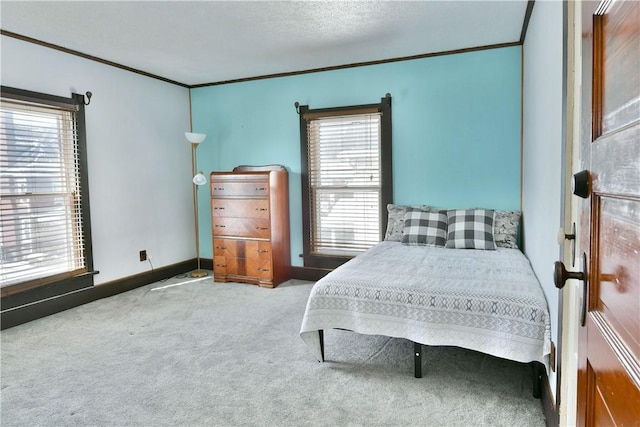 bedroom with carpet flooring and ornamental molding