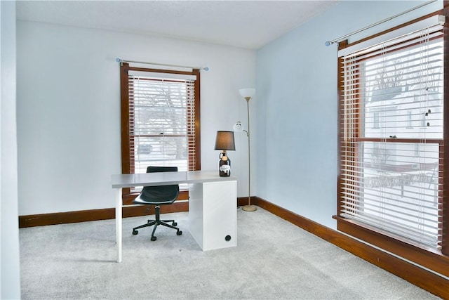 home office featuring light colored carpet