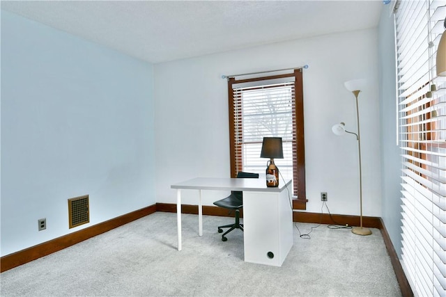 view of carpeted home office