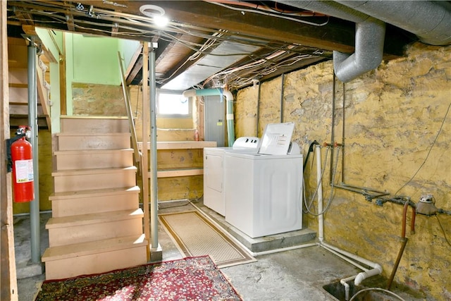 basement featuring separate washer and dryer