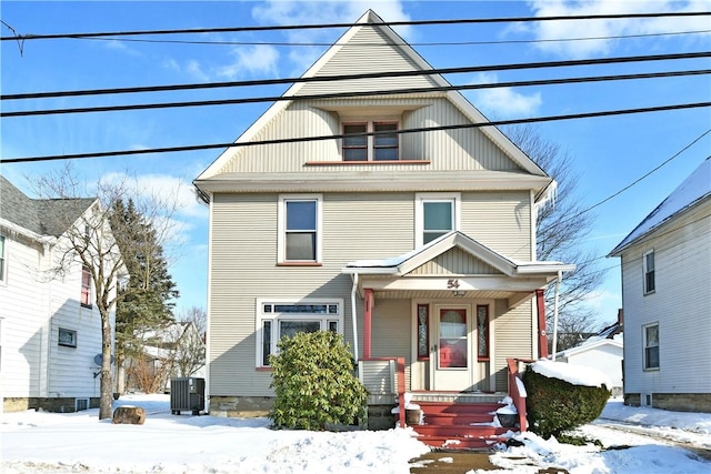 front facade featuring central AC unit