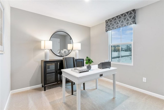office area with baseboards and light colored carpet
