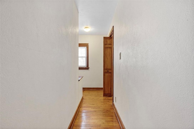 hallway featuring light hardwood / wood-style flooring