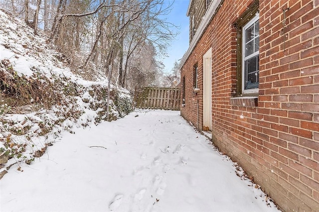 view of yard covered in snow