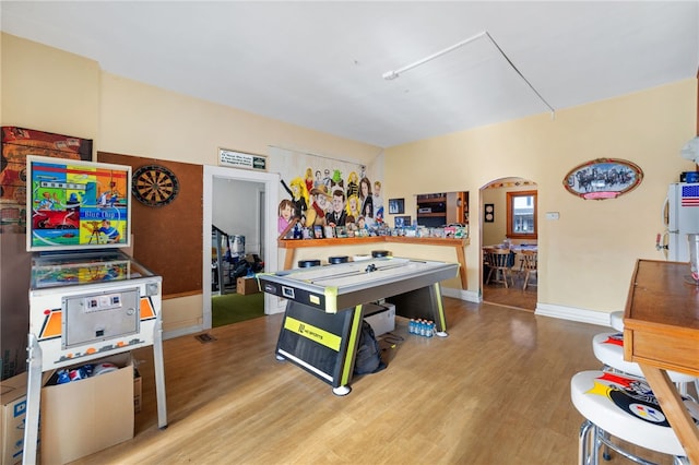 playroom featuring hardwood / wood-style floors