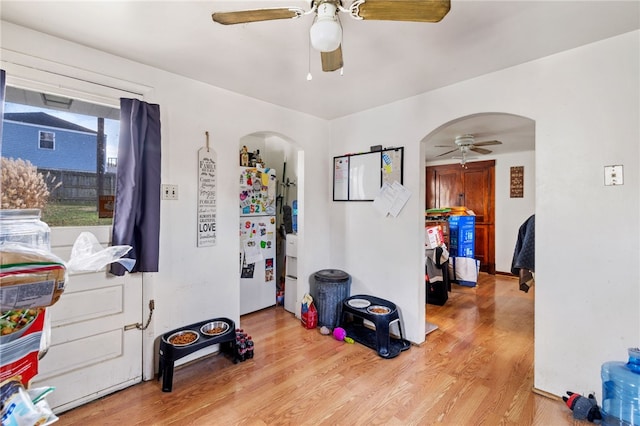 miscellaneous room with ceiling fan and wood-type flooring