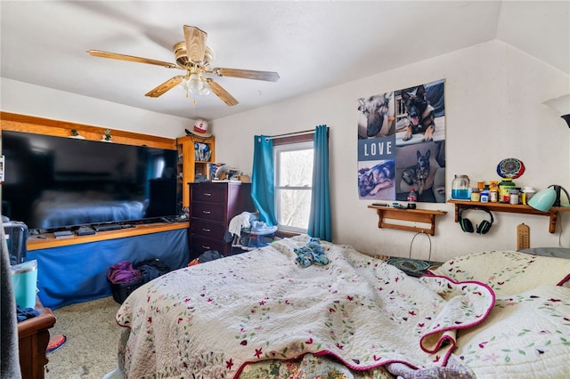 bedroom featuring ceiling fan and lofted ceiling