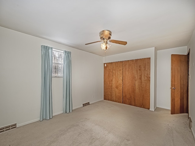 4024 Glen Eden Rd, Cranberry Twp, PA 16066 - unfurnished bedroom featuring a closet, light colored carpet, ceiling fan, and baseboards