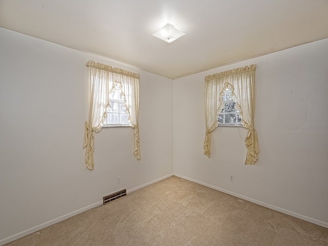 view of carpeted spare room