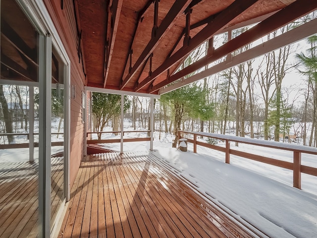 view of snow covered deck