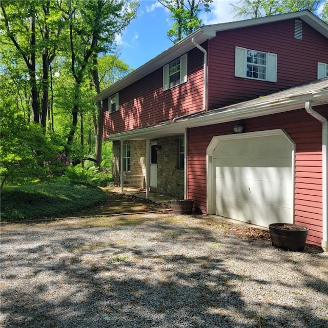 4024 Glen Eden Rd, Cranberry Twp, PA 16066 - view of home's exterior with an attached garage and driveway