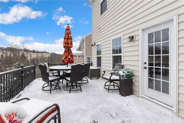 view of snow covered patio