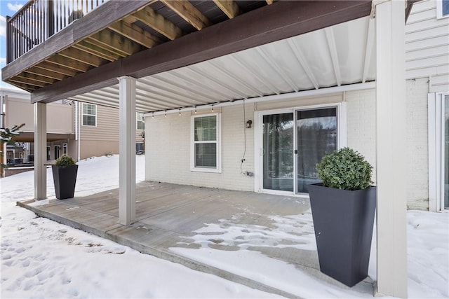 view of snow covered patio