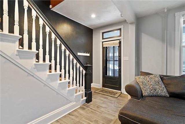 entrance foyer with light hardwood / wood-style flooring