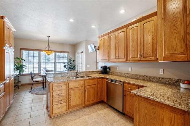 kitchen featuring kitchen peninsula, decorative light fixtures, dishwasher, light stone counters, and sink