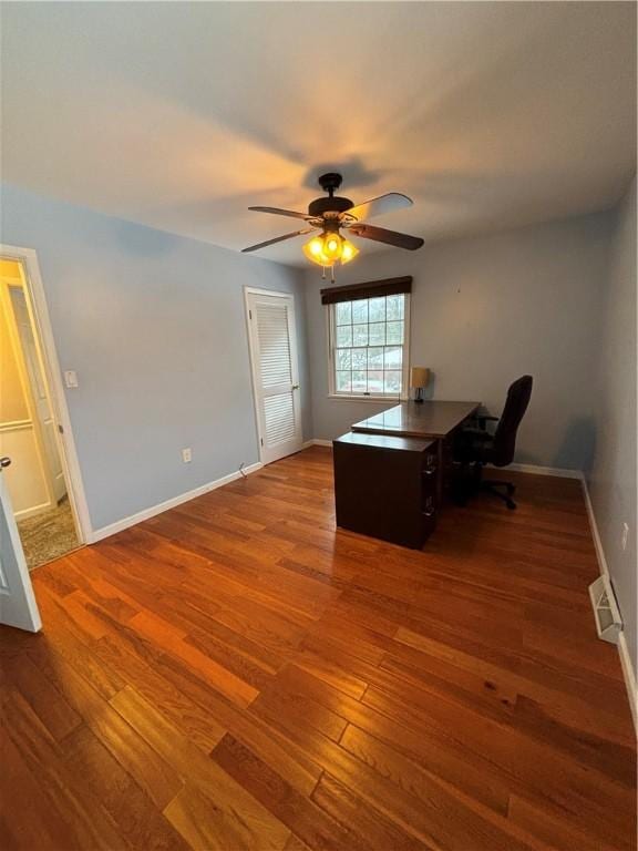 office space with ceiling fan and wood-type flooring