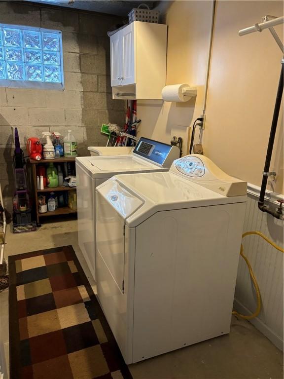 laundry room featuring washing machine and dryer