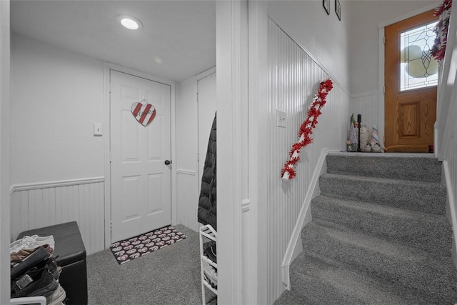 foyer featuring carpet