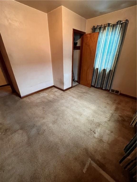 view of carpeted spare room