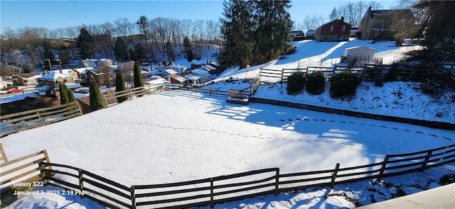 view of yard covered in snow