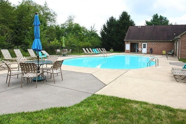 view of pool with a patio area