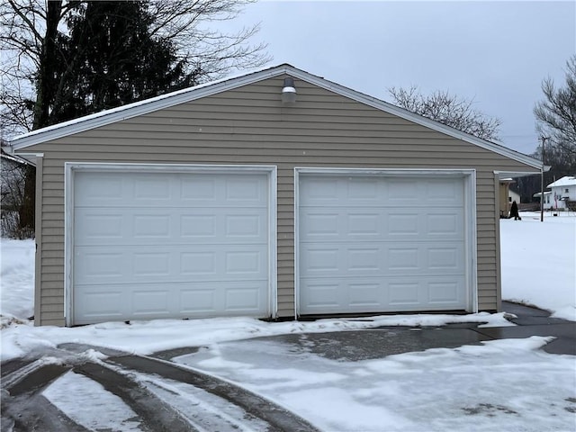 view of snow covered garage