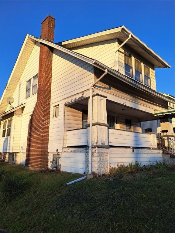 view of home's exterior featuring a lawn