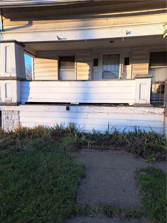 property entrance with a porch