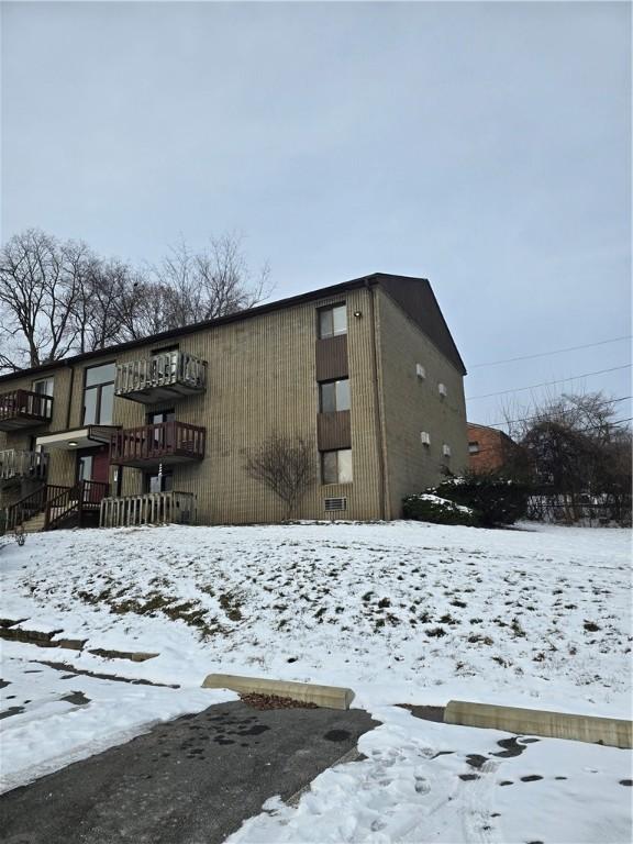 view of snow covered building