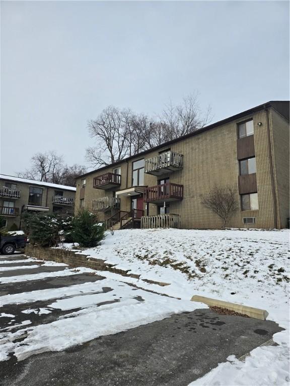 view of snow covered property