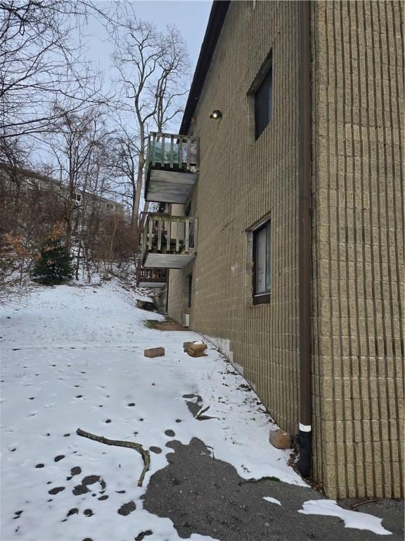 view of snow covered property