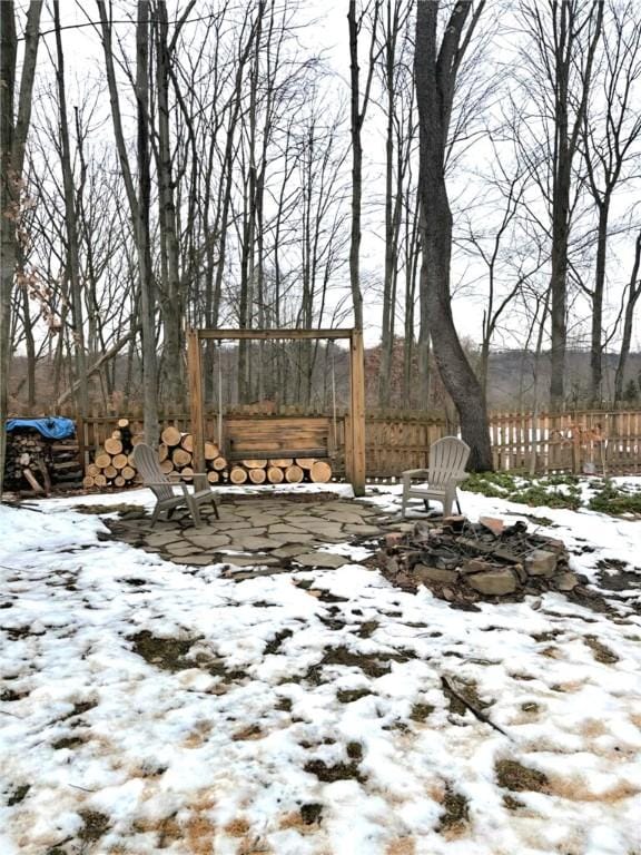 view of yard covered in snow