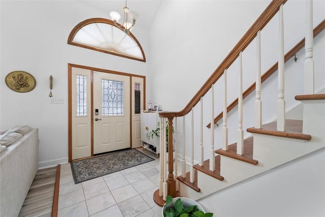 foyer with a notable chandelier