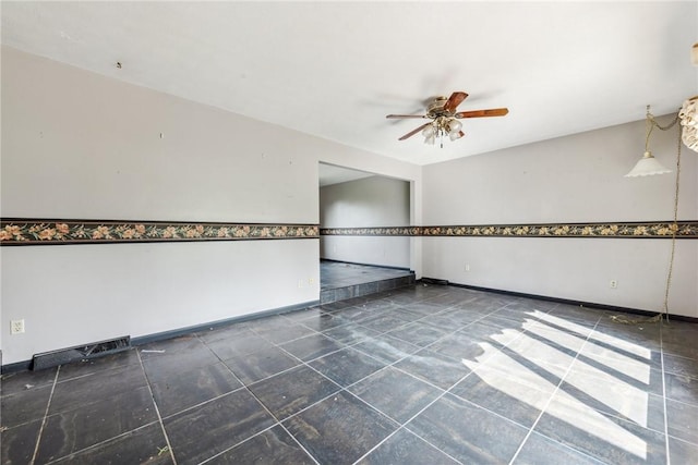 empty room with ceiling fan