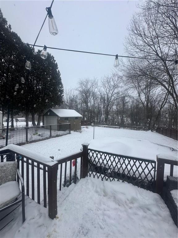 view of snow covered deck