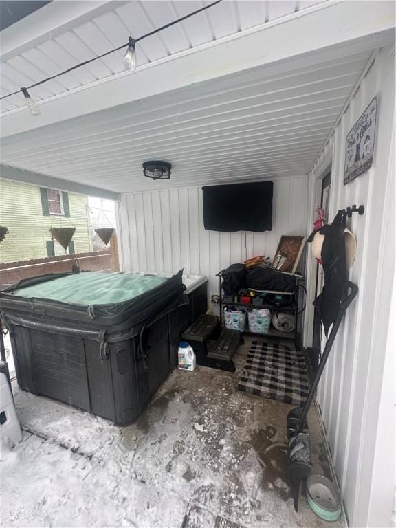 view of patio / terrace with a hot tub